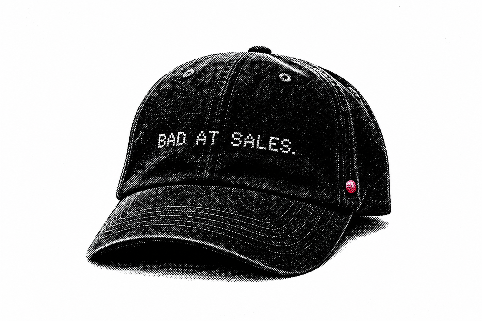 The 'Bad At Sales.' hat — the conversation-starting merch, shot in high-contrast black and white